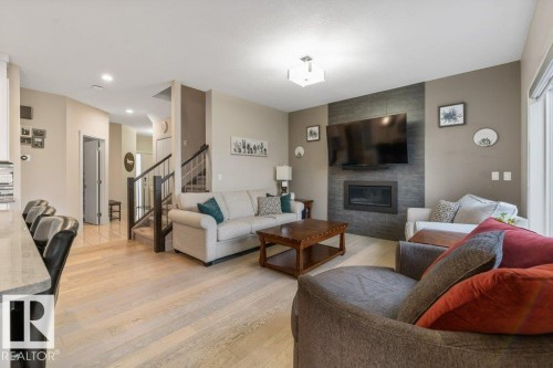 3632 Hummingbird Way, Edmonton, AB - Indoor Photo Showing Living Room With Fireplace