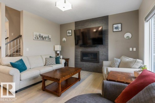3632 Hummingbird Way, Edmonton, AB - Indoor Photo Showing Living Room With Fireplace