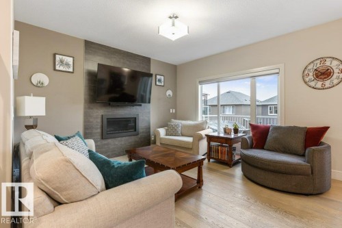 3632 Hummingbird Way, Edmonton, AB - Indoor Photo Showing Living Room With Fireplace