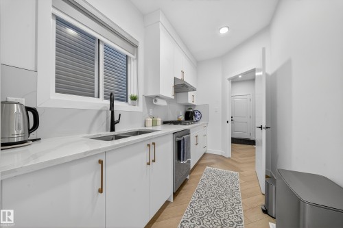 16527 3 Street, Edmonton, AB - Indoor Photo Showing Kitchen With Double Sink