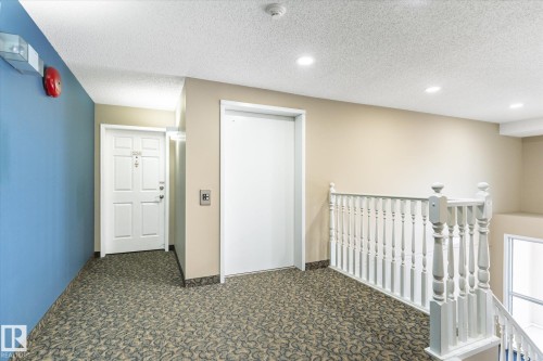 105 8811 106A Avenue, Edmonton, AB - Indoor Photo Showing Other Room