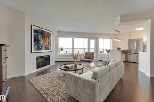1003 12319 Jasper Avenue, Edmonton, AB - Indoor Photo Showing Living Room With Fireplace