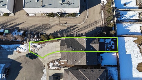 Aerial view highlighting the property's footprint, including the driveway and a section of the backyard - 1426 25 Avenue, Edmonton, AB - 