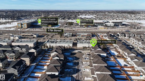 Aerial view showcasing the property's location within a residential neighborhood, with 17th Street and the Meadows Rec Center visible in the surrounding area - 1426 25 Avenue, Edmonton, AB - Outdoor With View