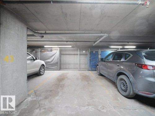 302 1589 Glastonbury Boulevard, Edmonton, AB - Indoor Photo Showing Garage