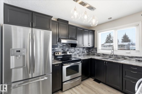 4326 49 Ave, St. Paul Town, AB - Indoor Photo Showing Kitchen With Double Sink With Upgraded Kitchen