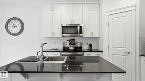 4112 171 Avenue, Edmonton, AB - Indoor Photo Showing Kitchen With Double Sink With Upgraded Kitchen