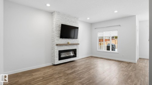 4112 171 Avenue, Edmonton, AB - Indoor Photo Showing Living Room With Fireplace