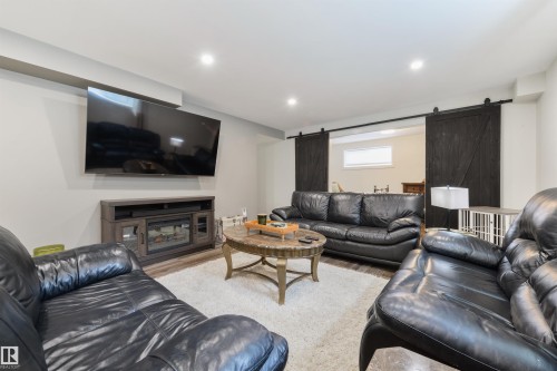 46 Longview Crescent, Spruce Grove, AB - Indoor Photo Showing Living Room With Fireplace