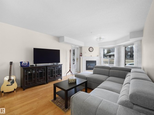 103 6703 172 Street, Edmonton, AB - Indoor Photo Showing Living Room With Fireplace
