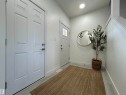 Foyer entrance with baseboards and recessed lighting - 19634 29 Avenue, Edmonton, AB  - Indoor Photo Showing Other Room 
