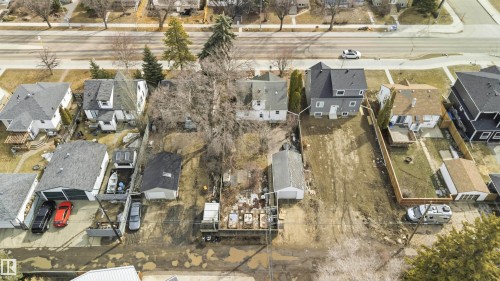 Aerial perspective showcasing a residential property with a detached garage - 6036 106 Street, Edmonton, AB - Outdoor With View