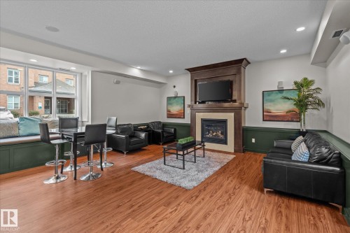 316 667 Watt Boulevard, Edmonton, AB - Indoor Photo Showing Living Room With Fireplace