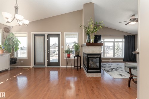 4206 Triomphe Point(E), Beaumont, AB - Indoor With Fireplace