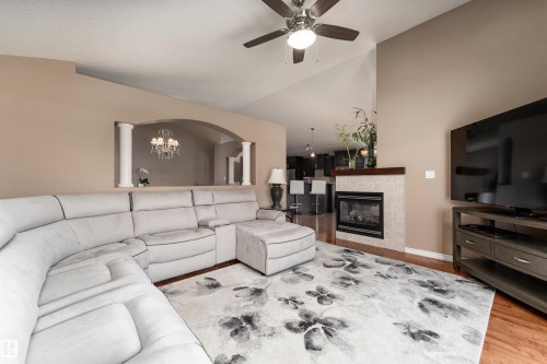 4206 Triomphe Point(E), Beaumont, AB - Indoor Photo Showing Living Room With Fireplace