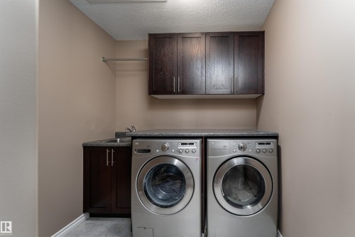 4206 Triomphe Point(E), Beaumont, AB - Indoor Photo Showing Laundry Room