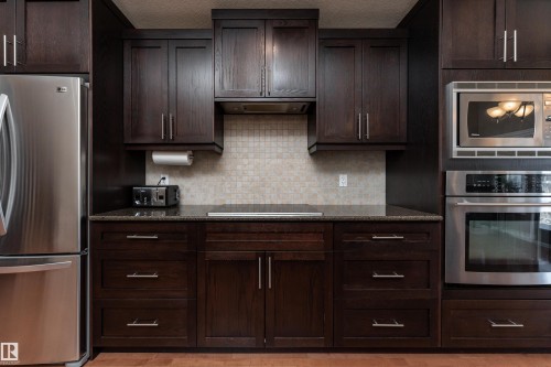 4206 Triomphe Point(E), Beaumont, AB - Indoor Photo Showing Kitchen With Stainless Steel Kitchen