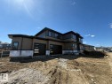 Contemporary two-story residence featuring a combination of horizontal siding and vertical paneling - 33 Harley Way Nw, Spruce Grove, AB  - Outdoor 
