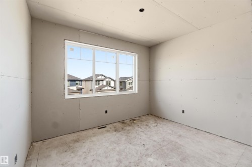 Bright interior space with a large window - 33 Harley Way Nw, Spruce Grove, AB - Indoor
