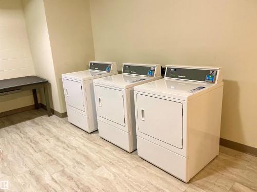 320 8604 Gateway Boulevard, Edmonton, AB - Indoor Photo Showing Laundry Room