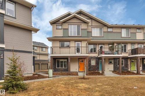 79 50 Mclaughlin Drive, Spruce Grove, AB - Outdoor With Balcony With Facade