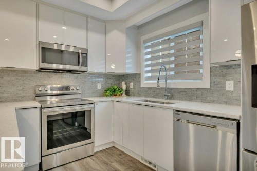 58 230 Edgemont Road, Edmonton, AB - Indoor Photo Showing Kitchen With Double Sink With Upgraded Kitchen