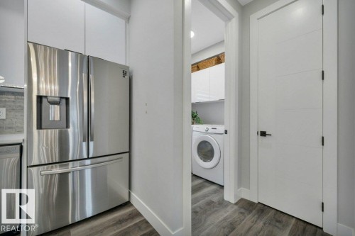 58 230 Edgemont Road, Edmonton, AB - Indoor Photo Showing Laundry Room