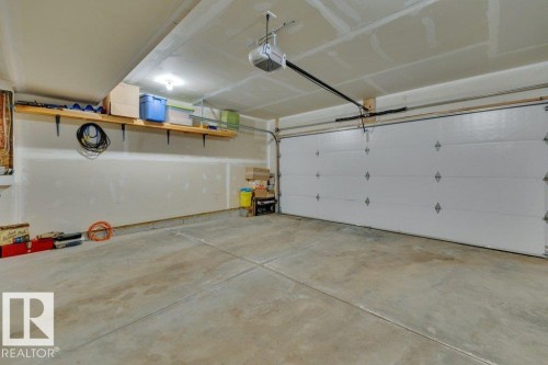 58 230 Edgemont Road, Edmonton, AB - Indoor Photo Showing Garage