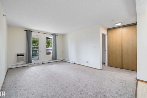 101 4812 51 Avenue, Stony Plain, AB - Indoor Photo Showing Other Room