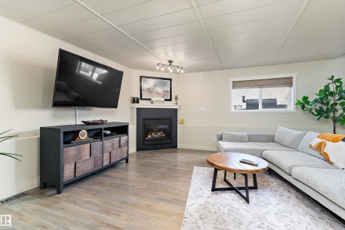 84 Delage Crescent, St. Albert, AB - Indoor Photo Showing Living Room With Fireplace