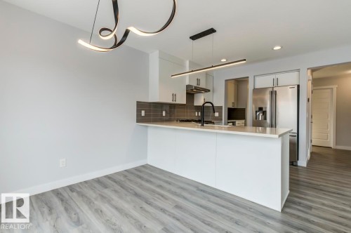 1714 169 St Sw, Edmonton, AB - Indoor Photo Showing Kitchen With Double Sink