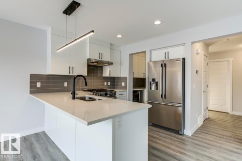 1714 169 St Sw, Edmonton, AB - Indoor Photo Showing Kitchen With Double Sink With Upgraded Kitchen