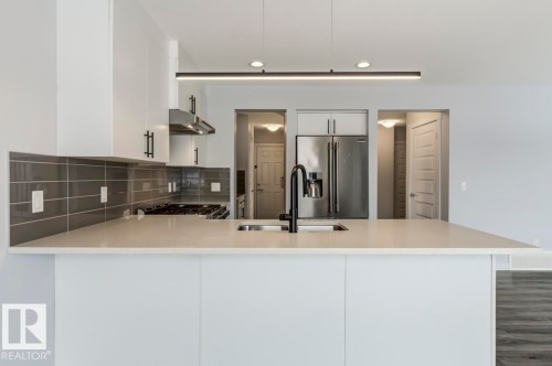 1714 169 St Sw, Edmonton, AB - Indoor Photo Showing Kitchen With Double Sink