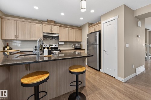 31 5203 149 Avenue, Edmonton, AB - Indoor Photo Showing Kitchen With Stainless Steel Kitchen With Double Sink