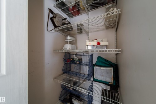 The property offers a closet with wire shelving for storage - 11 Granada Place, St. Albert, AB - Indoor Photo Showing Other Room