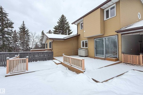 The property features a private outdoor area with a patio and a wooden fence - 11 Granada Place, St. Albert, AB - Outdoor With Exterior