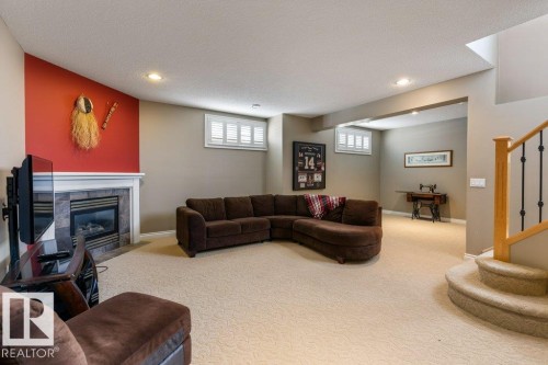 20 Keystone Crescent, St. Albert, AB - Indoor Photo Showing Basement With Fireplace