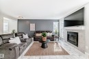 4404 6 Street, Edmonton, AB  - Indoor Photo Showing Living Room With Fireplace 