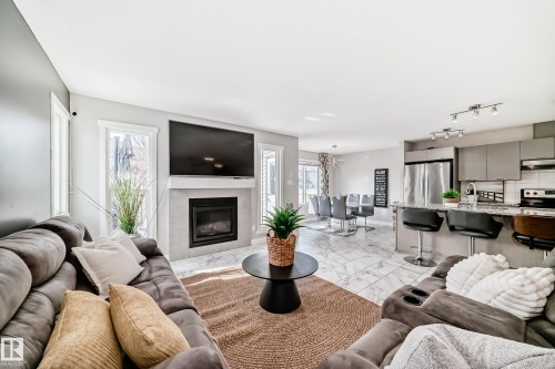 4404 6 Street, Edmonton, AB - Indoor Photo Showing Living Room With Fireplace