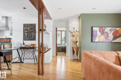 The property features light hardwood floors and recessed lighting throughout - 