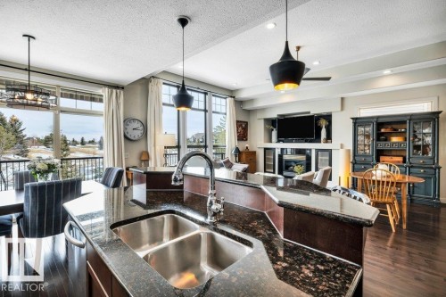 53-841 156 Street Nw, Edmonton, AB - Indoor Photo Showing Kitchen With Fireplace With Double Sink
