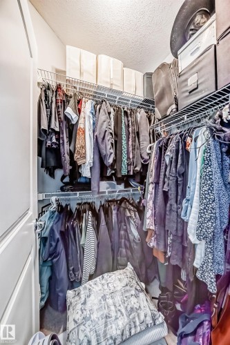 Walk-in closet with wire shelving and hanging rods providing ample storage - 307 10121 80 Avenue, Edmonton, AB - Indoor With Storage