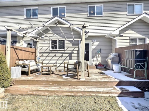 The property features a tiered wooden deck with a pergola structure, ideal for outdoor enjoyment - 5718 Rue Eaglemont, Beaumont, AB - Outdoor With Deck Patio Veranda With Exterior