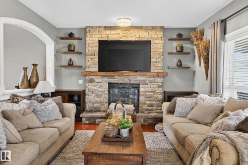 3 Erin Close, St. Albert, AB - Indoor Photo Showing Living Room With Fireplace