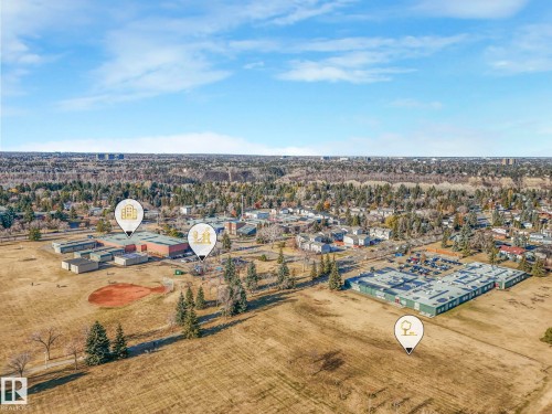 Drone / aerial view of a tree filled landscape - 5833 Riverbend Road, Edmonton, AB - Outdoor With View