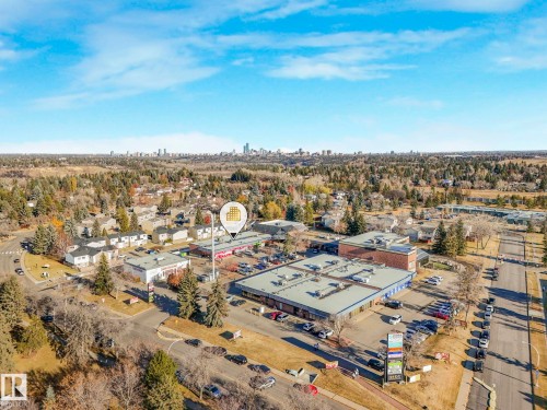 Aerial view of property and surrounding area featuring a tree filled landscape - 5833 Riverbend Road, Edmonton, AB - Outdoor With View