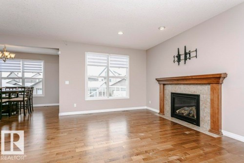 16861 58A Street Nw, Edmonton, AB - Indoor Photo Showing Living Room With Fireplace