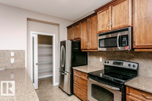 16861 58A Street Nw, Edmonton, AB - Indoor Photo Showing Kitchen With Stainless Steel Kitchen
