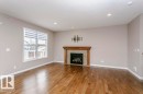 16861 58A Street Nw, Edmonton, AB  - Indoor Photo Showing Living Room With Fireplace 
