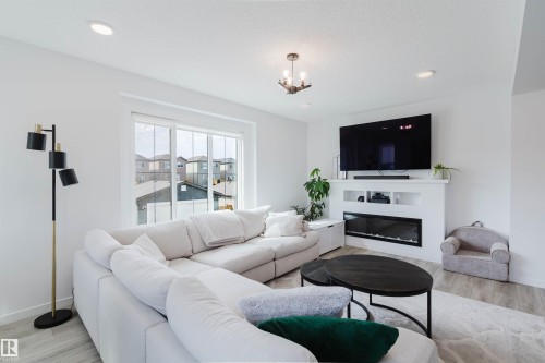 118 Secord Drive, Edmonton, AB - Indoor Photo Showing Living Room With Fireplace